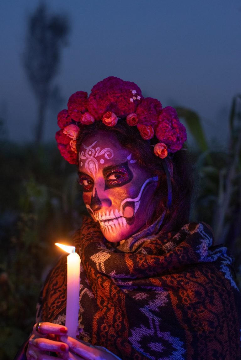 Woman,With,Traditional,Catrina,Makeup,And,A,Flower,Crown,Holds