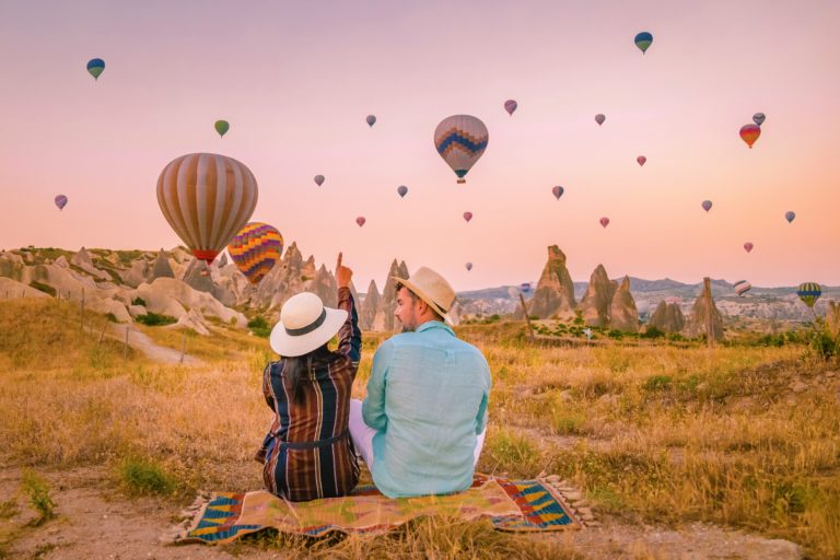 Cappadocia,Turkey,During,Sunrise,,Couple,Mid,Age,Men,And,Woman